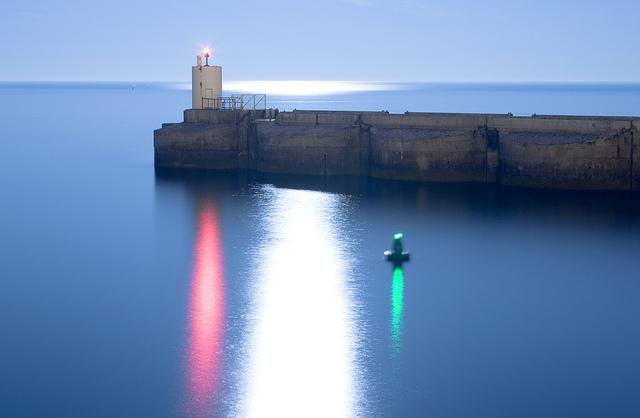 Brighton Marina Harbour Entrance Lights and Reflected Moonlight Glint