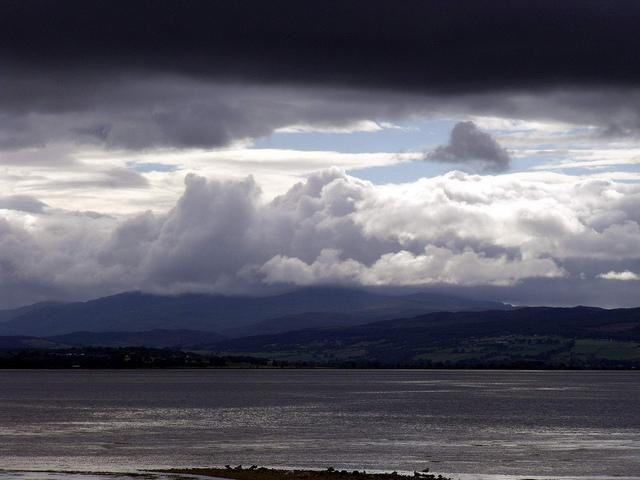 Dark clouds over western end of Beauly Firth Inverness Scotland