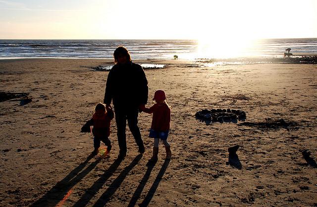 Lexie, Candy and Ella leave the sandcastle, Littlehampton, Jan. 2007